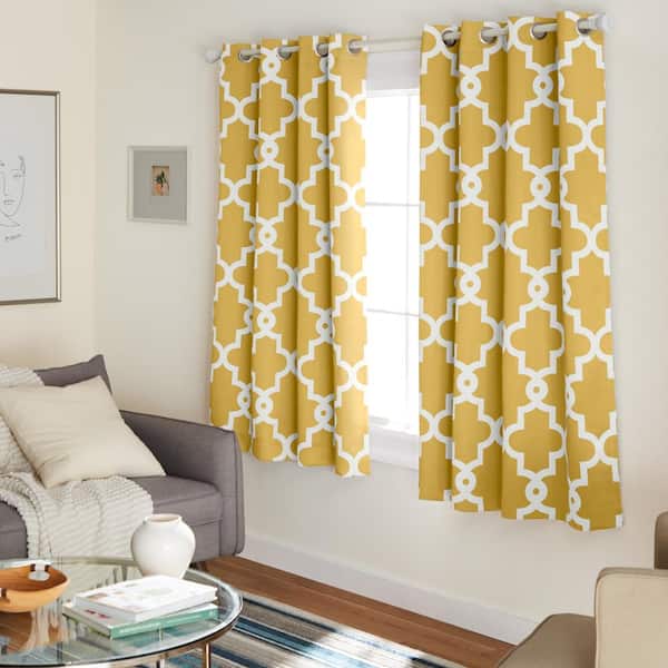 EXCLUSIVE HOME Ironwork Sundress Yellow Woven Trellis 52 in. W x 63 in. L Noise Cancelling Grommet Blackout Curtain (Set of 2)