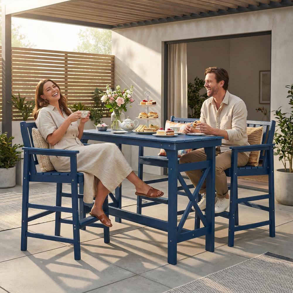 Two people sitting on navy blue bar stools at a navy blue outdoor bar table.
