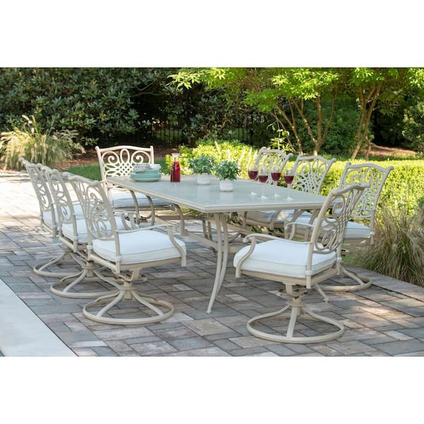 Hanover Traditions 9-Piece Aluminum Outdoor Dining Set with 8 Swivel Rockers and Cast Table with Beige Cushions