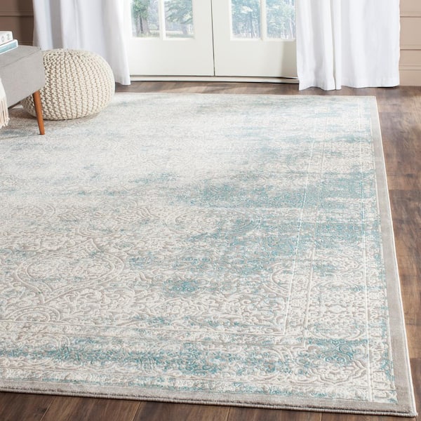 Passion 11 ft. x 15 ft. Turquoise/Ivory Distressed Border Area Rug