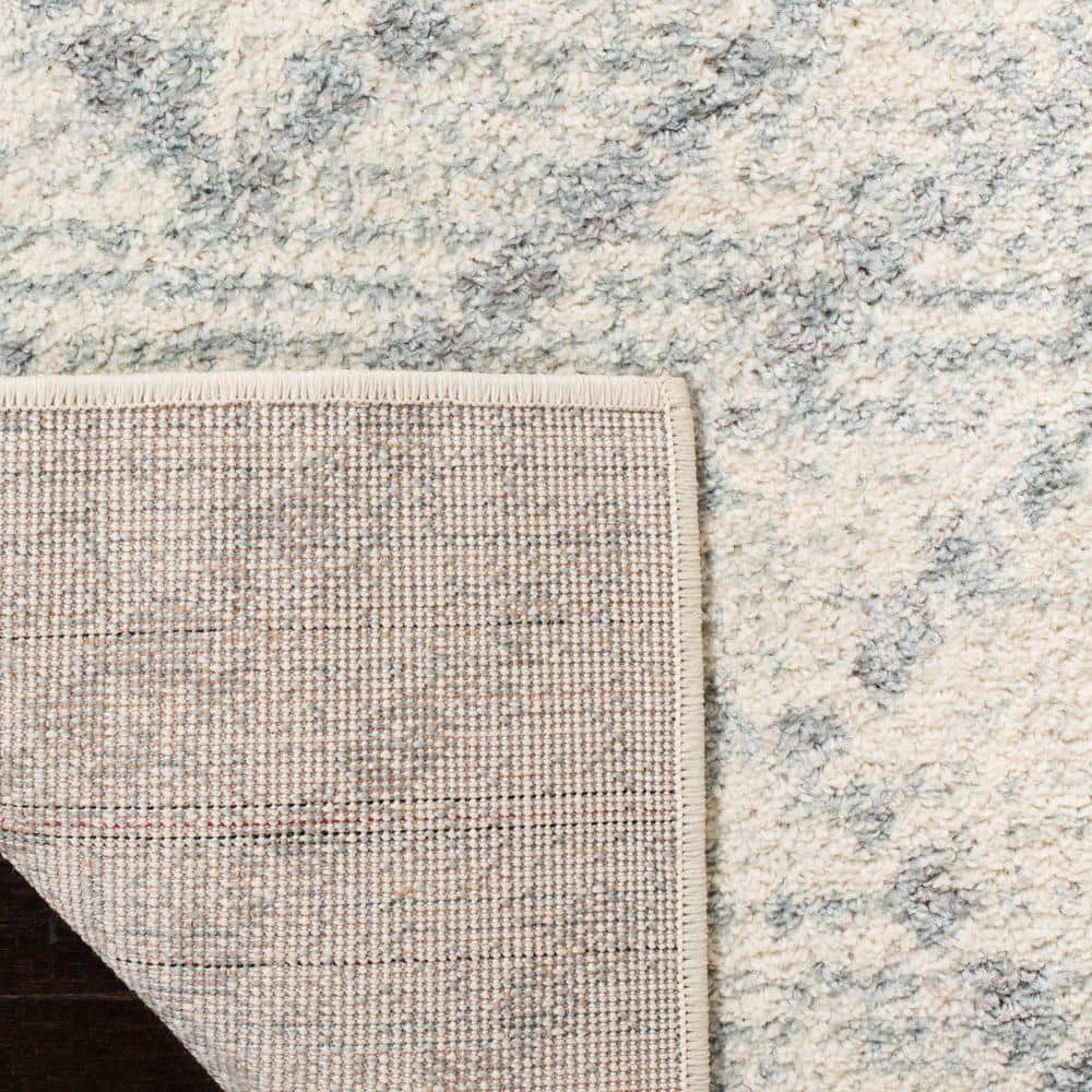 Ivory and Light Blue Geometric Rectangular Area Rug