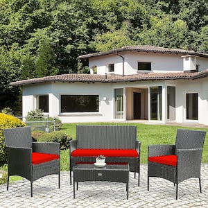 4-Piece Wicker Patio Conversation Set with Coffee Table and Red Cushions