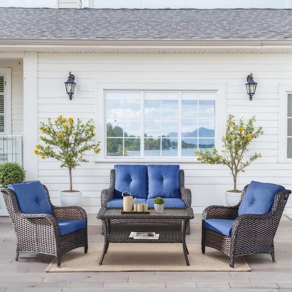 Carlos Brown 4-Piece Wicker Patio Conversation Set with Armchairs, CushionGuard Blue Cushions