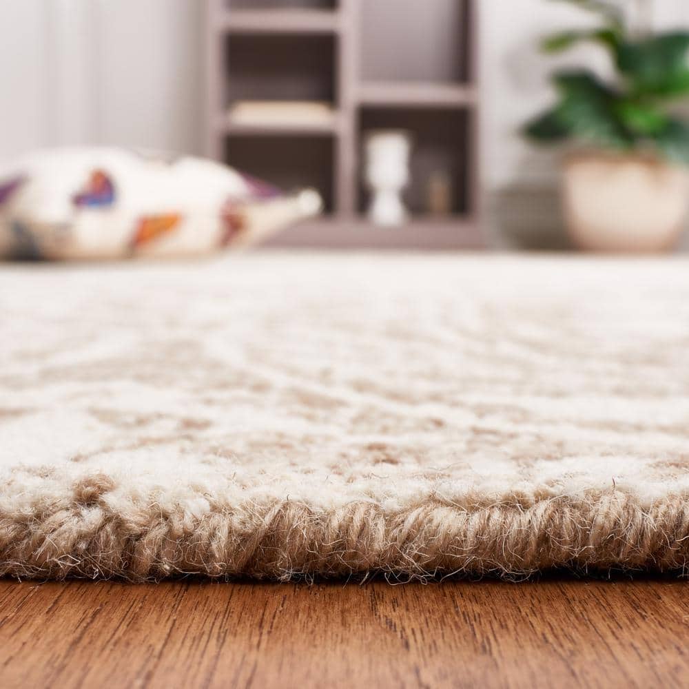 Ivory and Beige Abstract Wool 6' x 9' Handmade Tufted Rug