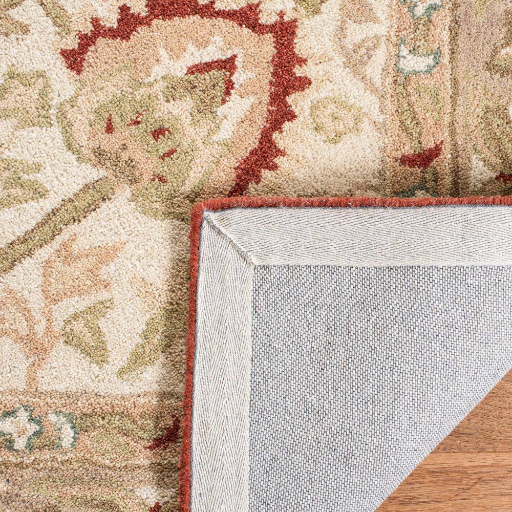 Handmade Floral Elegance Wool Area Rug 6' x 9' in Beige and Rust