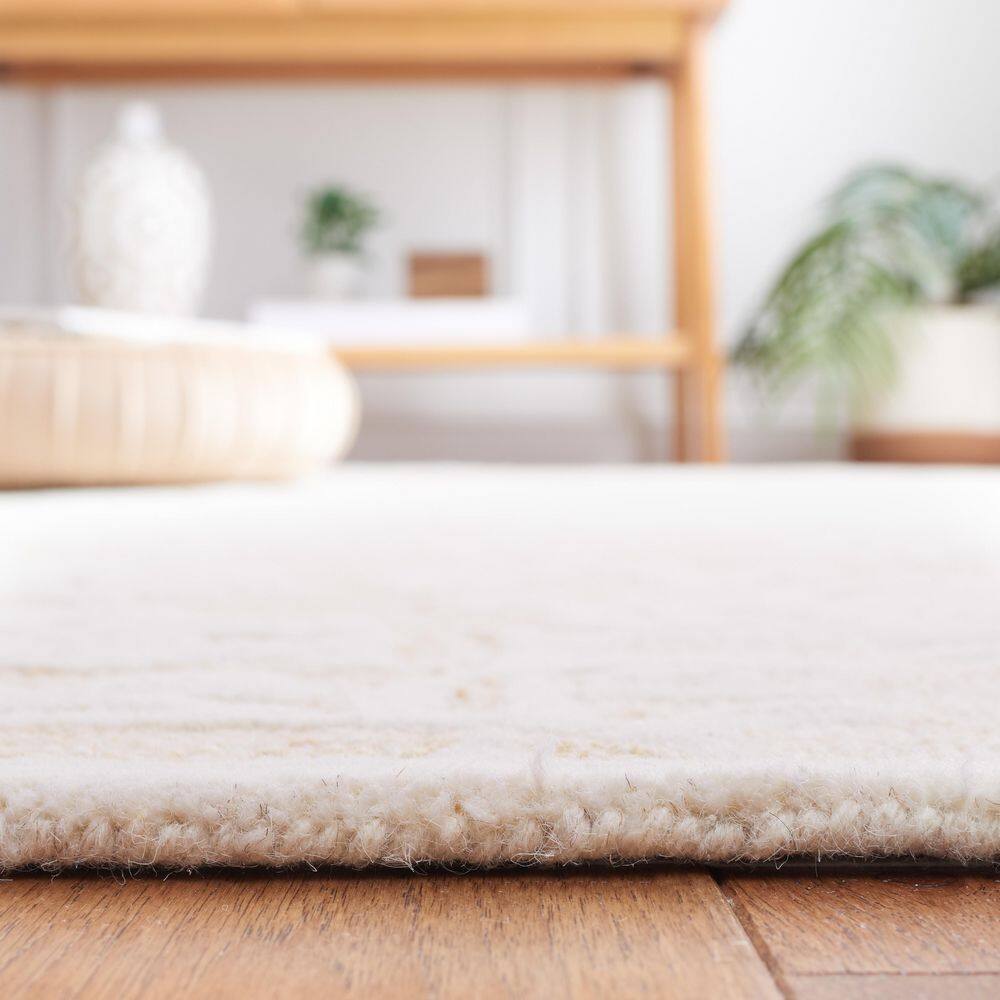 Handmade Ivory Floral Tufted Wool Area Rug 8' x 10'