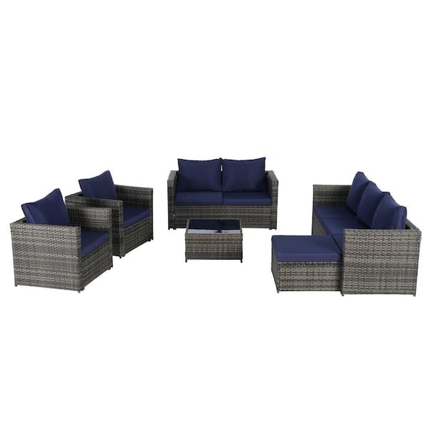 5-Piece Wicker Outdoor Sectional Sofa Set with Dark Blue Cushions and Coffee Table