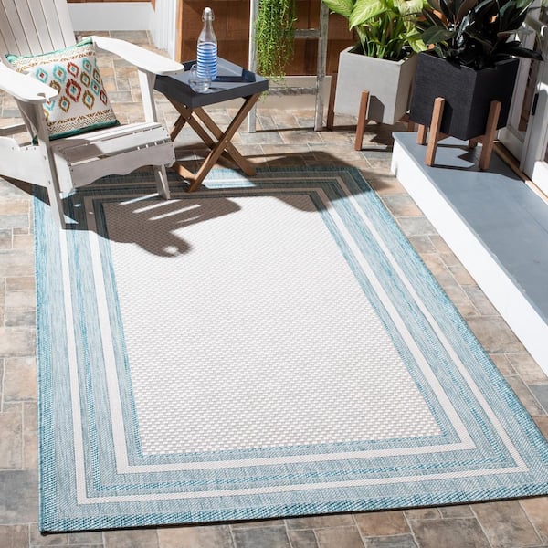Courtyard Ivory/Aqua 10 ft. x 14 ft. Solid Color Striped Indoor/Outdoor Area Rug