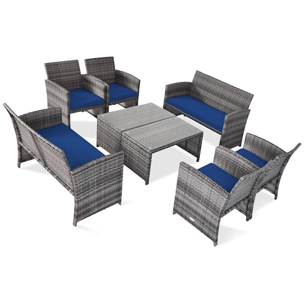 Costway 8-Piece Wicker Patio Conversation Set with Navy Cushions and Glass Table
