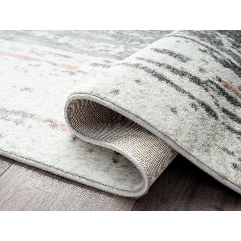 Gray and Pink Distressed Abstract 4' x 6' Synthetic Area Rug