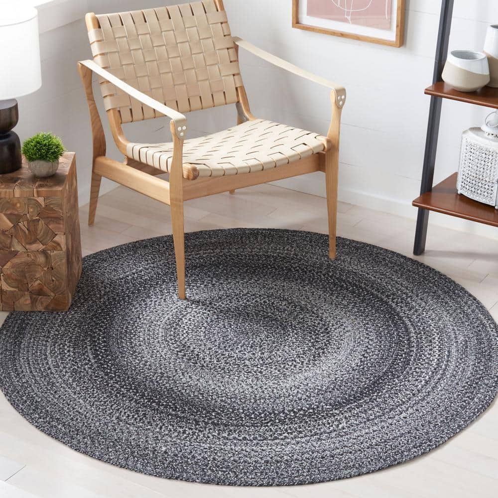 Handmade Black and Ivory Braided Round Synthetic Rug, 4' Diameter