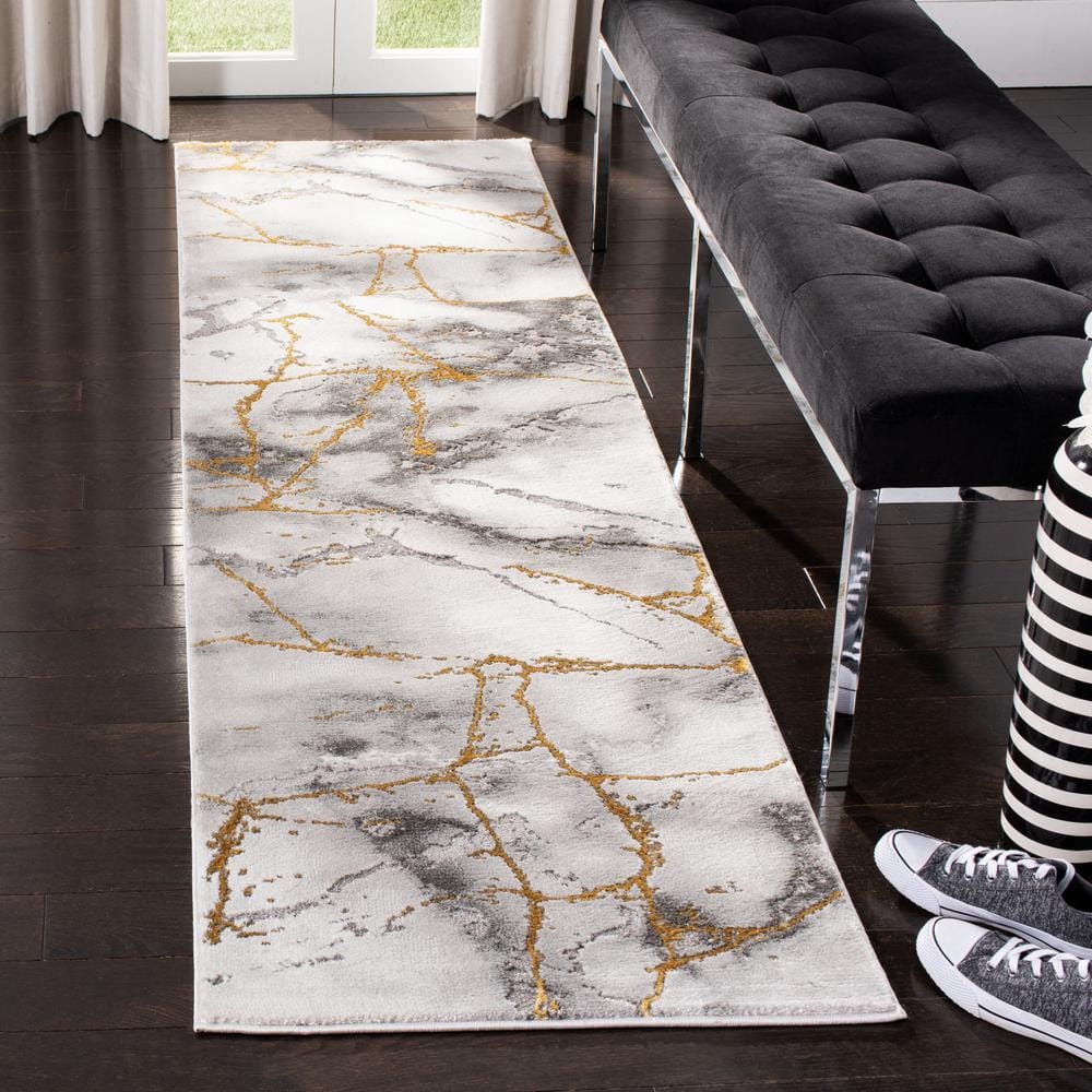 Elegant Abstract Gray and Gold 2' x 8' Synthetic Runner Rug