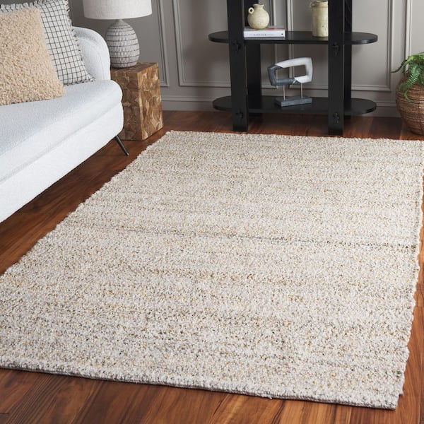 Renewal 8 ft. x 10 ft. Beige/Gold Distressed Solid Area Rug