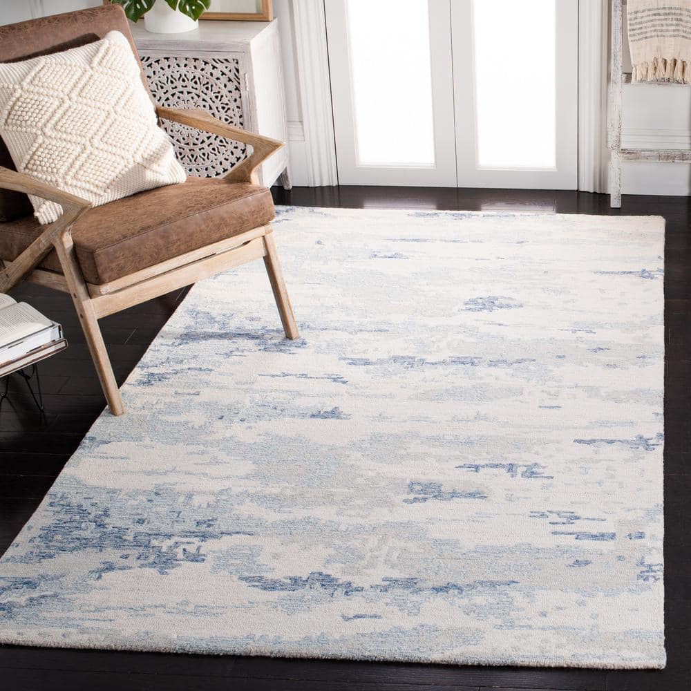 Ivory and Blue Handmade Wool Abstract Area Rug