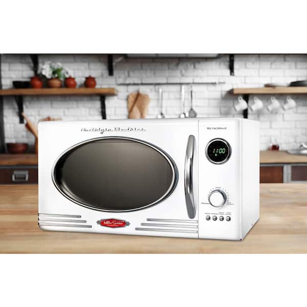 Nostalgia Retro Compact Countertop Microwave Oven - 0.7 Cu. Ft. - 700-Watts  with LED Digital Display - Child Lock - Easy Clean Interior - Red