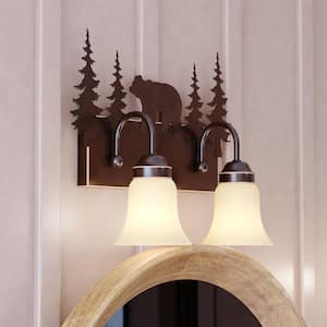 Bozeman 16.75 in. W 2-Light Bronze Rustic Bear Bathroom Vanity Light Fixture