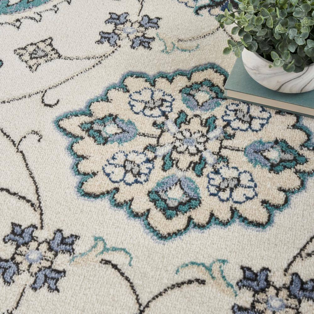Ivory Blue 10' x 14' Synthetic Rectangular Rug