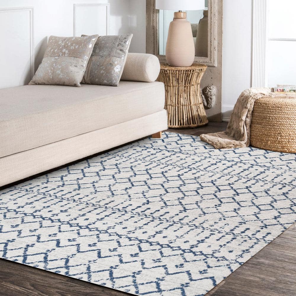 Ivory and Navy 4' x 6' Synthetic Trellis Area Rug