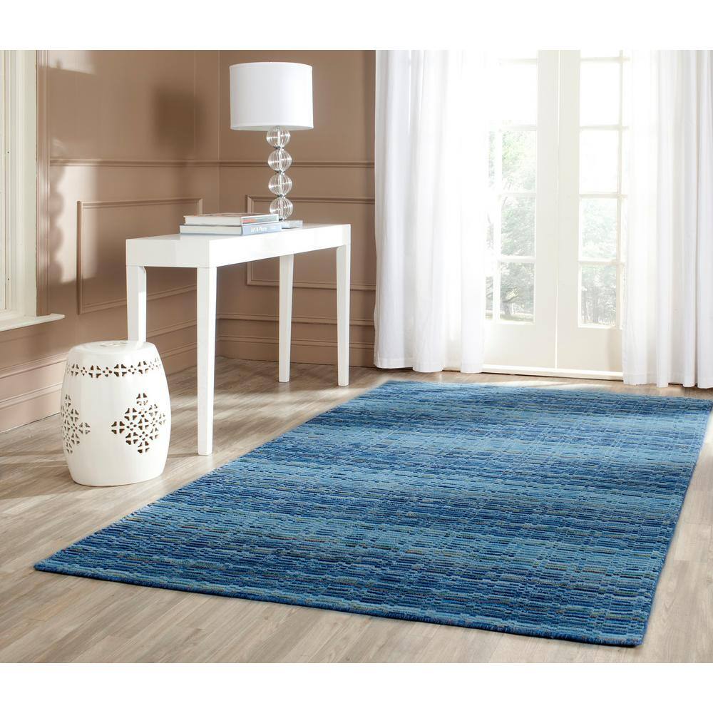 Handmade Blue Wool Round Area Rug, 2' x 3'