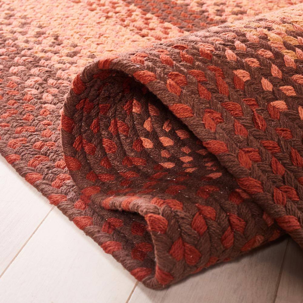 Handwoven Orange and Rust Braided Cotton Area Rug 4' x 6'