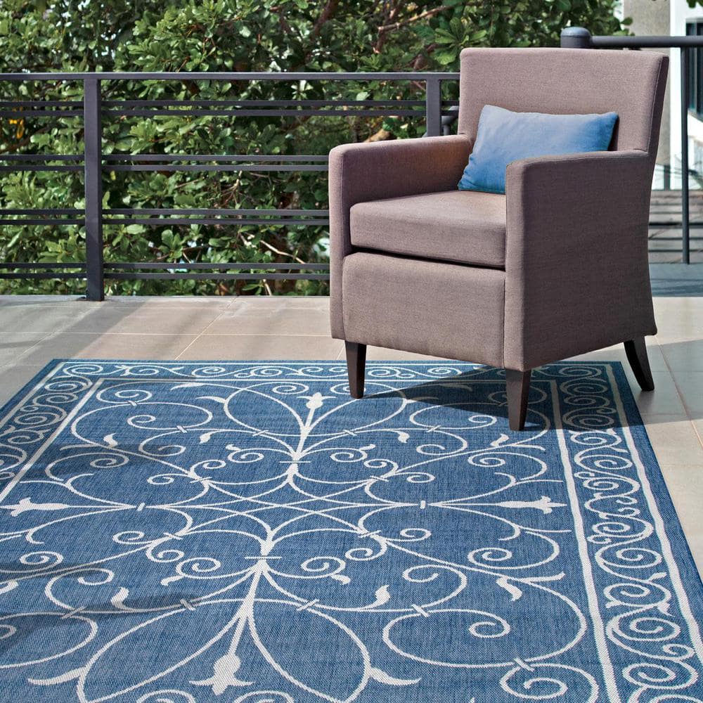 Kathleen Blue and White Synthetic 6' x 9' Rectangular Area Rug