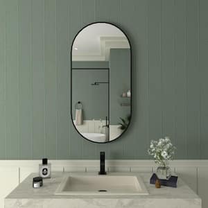 18 in. W. x 36 in. H Oval Framed Wall Bathroom Vanity Mirror in Matte Black