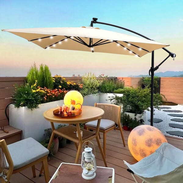 Unbranded 8.2 ft. Square Steel Market Solar LED Lighted Tilt Patio Umbrella in Tan with Crank and Cross Base
