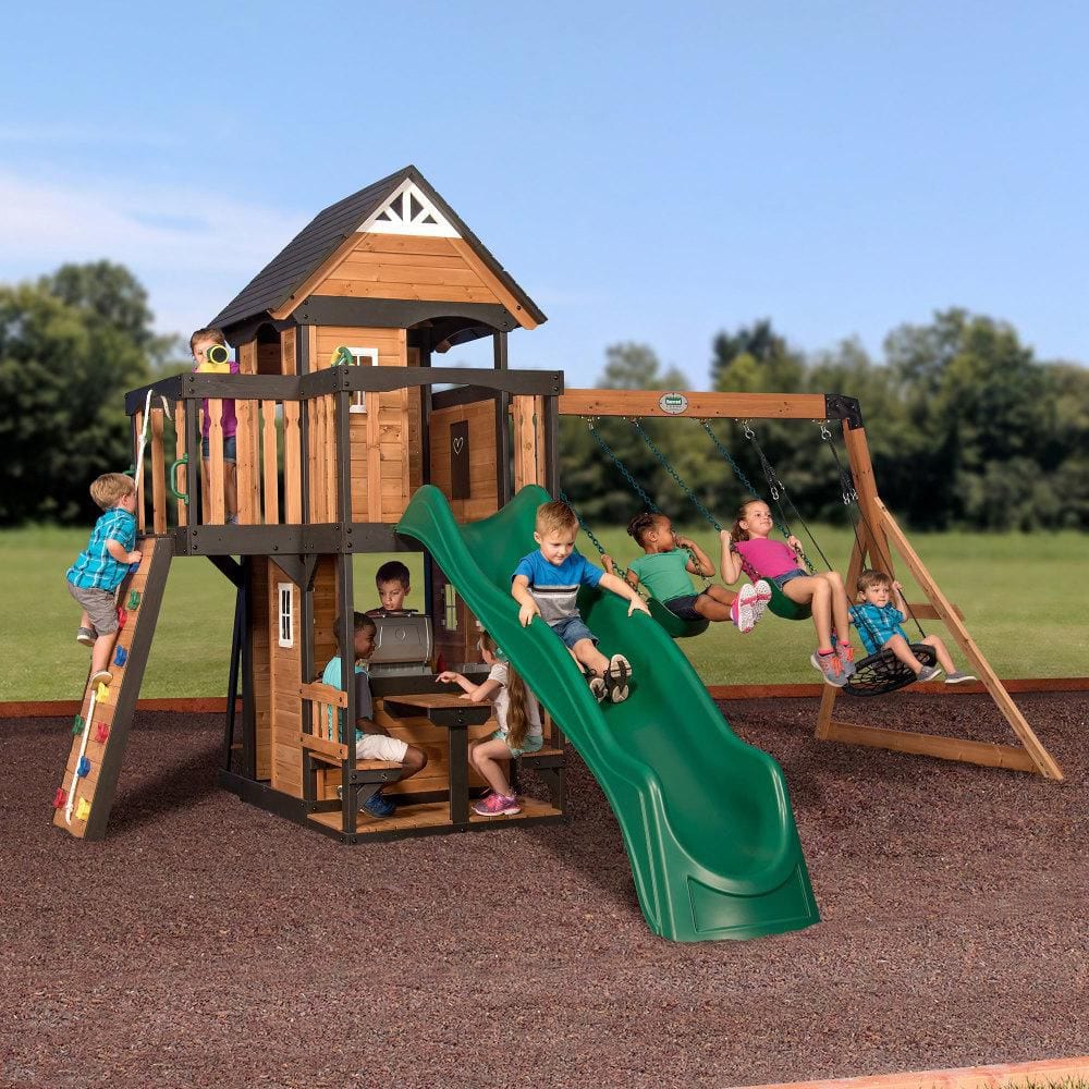 Backyard Discovery Canyon Creek Outdoor Kid's Playground Set w/ Rockwall, Upper Fort, Swing Set, Green Wave Slide, and PlaySet Kitchen