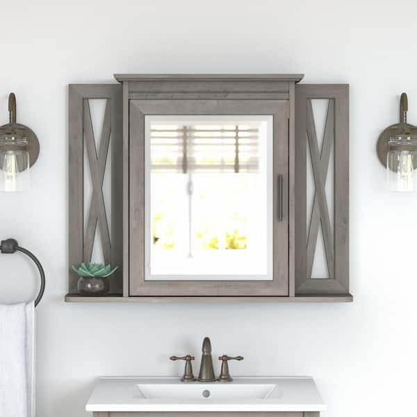 Bush Furniture Key West 31.89 in. W x 25 in. H Rectangular Particle Board Medicine Cabinet with Mirror in Driftwood Gray