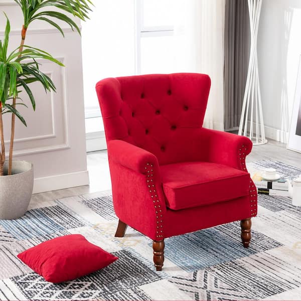 red velvet wingback chair