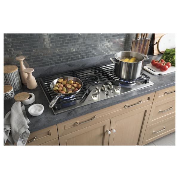 https://images.thdstatic.com/productImages/327d4892-70f2-4745-a72b-87413ec25816/svn/stainless-steel-ge-profile-gas-cooktops-pgp9036slss-40_600.jpg