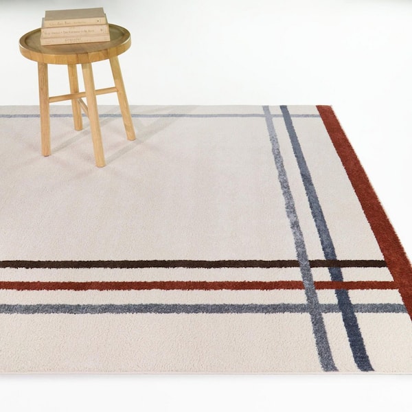 Mosley Rust 5 ft. x 7 ft. Striped Border Area Rug