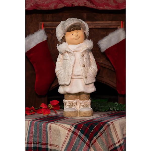 Alpine Corporation 20 in. Christmas Girl with Hands in Her Pocket Statue