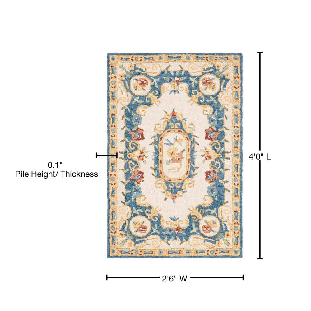 Handmade Cream and Blue Floral Wool Area Rug