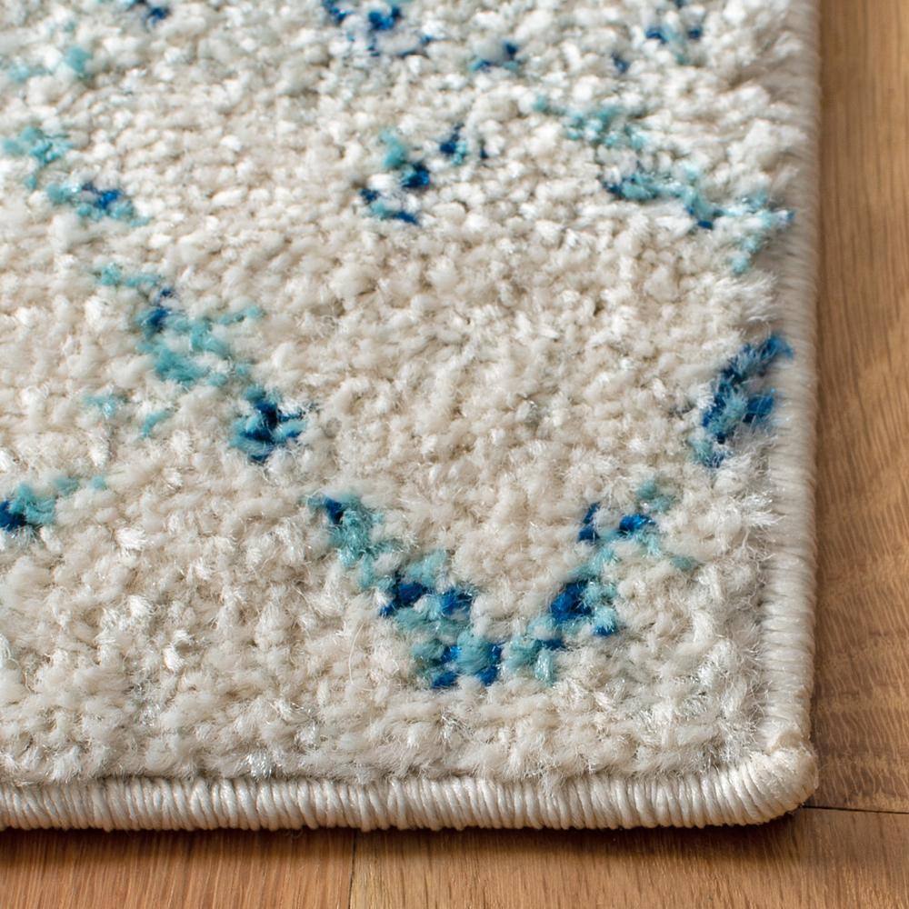 Elegant Ivory/Aqua Synthetic 9' x 12' Hand-Knotted Area Rug