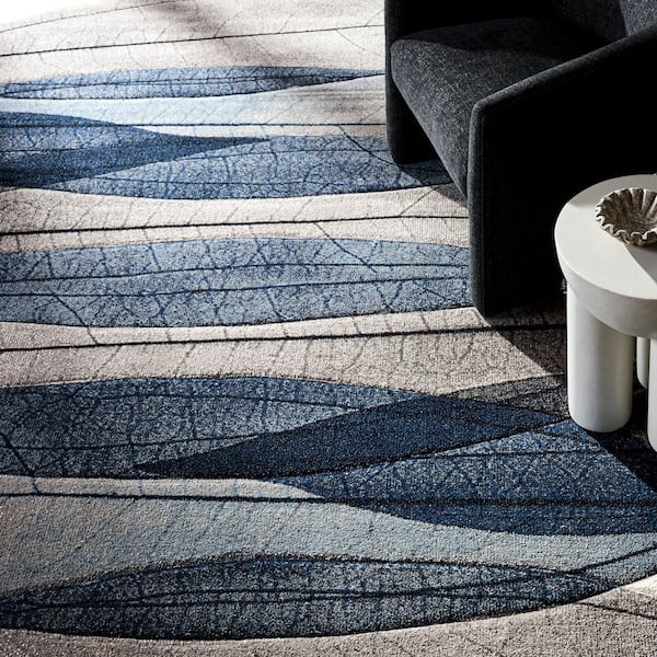 Hollywood 9 ft. x 12 ft. Ivory/Blue Abstract Geometric Area Rug