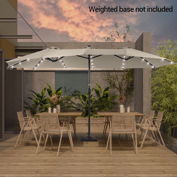 7 x 10 patio umbrella Sonkuki LED 10 ft. x 7 ft. Aluminum Frame Market Solar Rectangle Patio  Umbrella in Sand, With a Crank and Tilt Button R-HS-RLED19SD-H