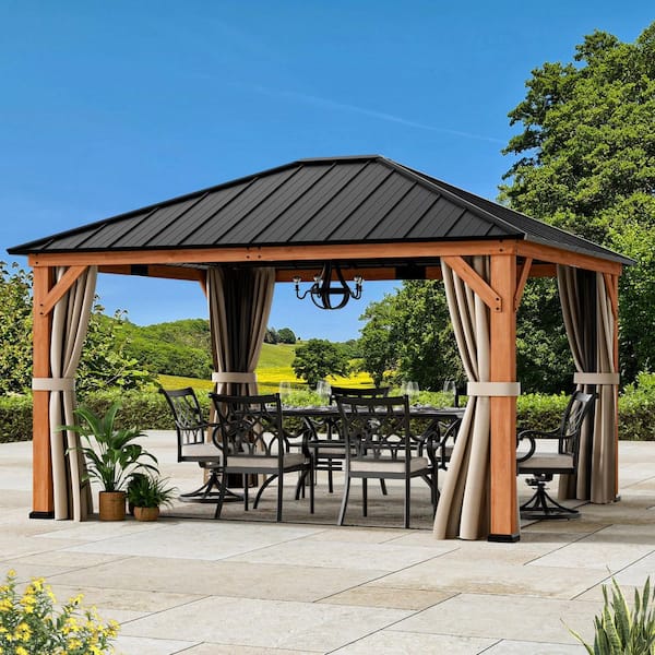 COVERED OUTDOOR OUTDOOR LIVING SPACES Ultra Series Wood Gazebo 12 ft. x 14 ft. Cedar Framed Wooden Gazebo with Galvanized Steel Roof, Netting and Curtains