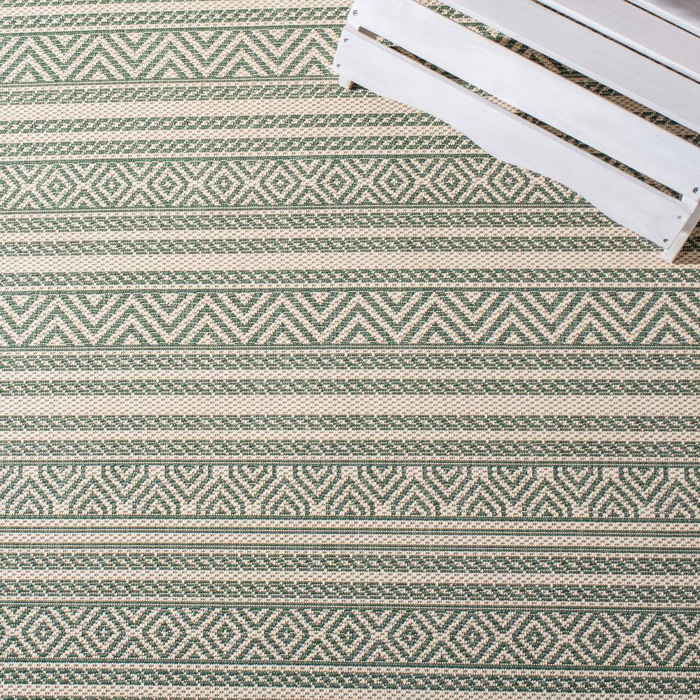 Beige and Dark Green 8' x 10' Stain-Resistant Synthetic Rug