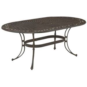 Sanibel Rust Bronze 7-Piece Cast Aluminum Oval Outdoor Dining Set with Coral Orange Cushions