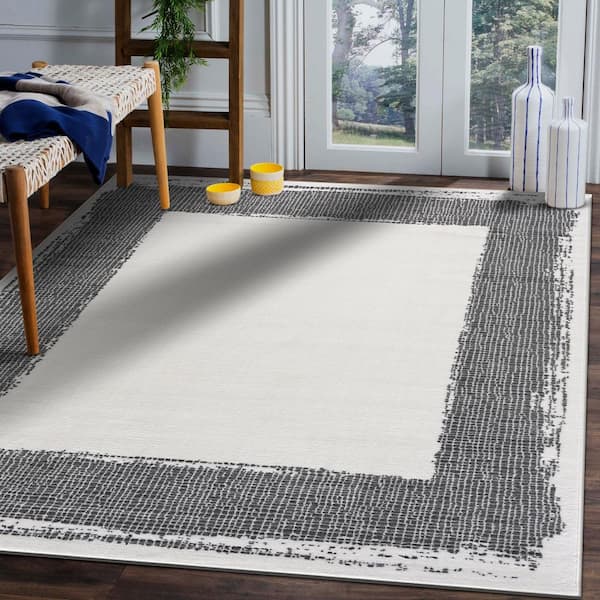 8 X 10 Cream Dark Gray Laguna Bordered Indoor Area Rug