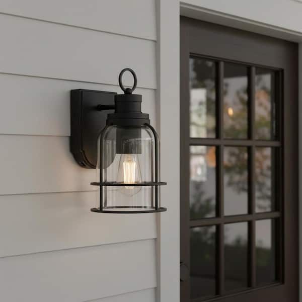 Camberly 12.13 in. Matte Black Motion Sensing Dusk to Dawn Outdoor Hardwired Wall Lantern Sconce with Clear Glass Shade