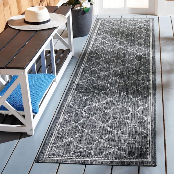 Courtyard Black/Gray 2 ft. x 9 ft. Dotted Clover Indoor/Outdoor Patio  Runner Rug