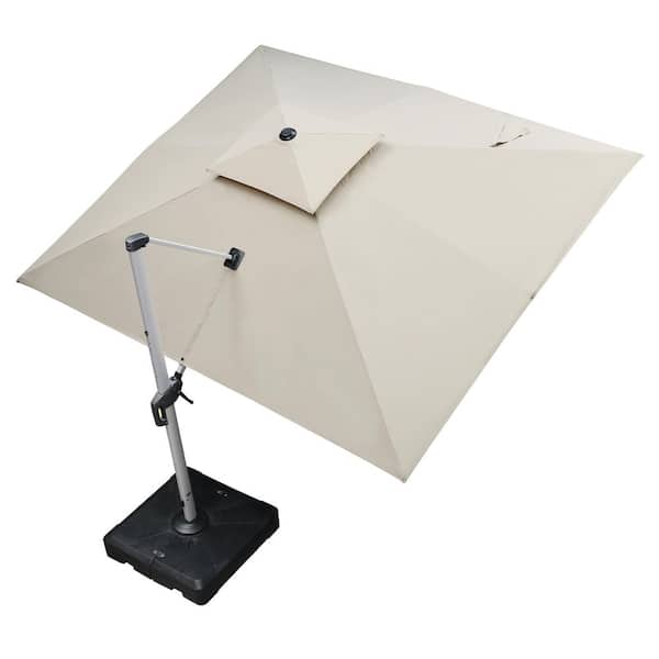 9 ft. x 12 ft. Sunbrella Aluminum Solar Powered LED Cantilever Offset Patio Umbrella with Base in Navy Blue