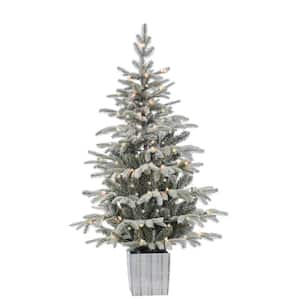 4.5 ft. Potted Lightly Flocked Natural Cut Iceland Fir Artificial Christmas Tree with 70 Clear Lights