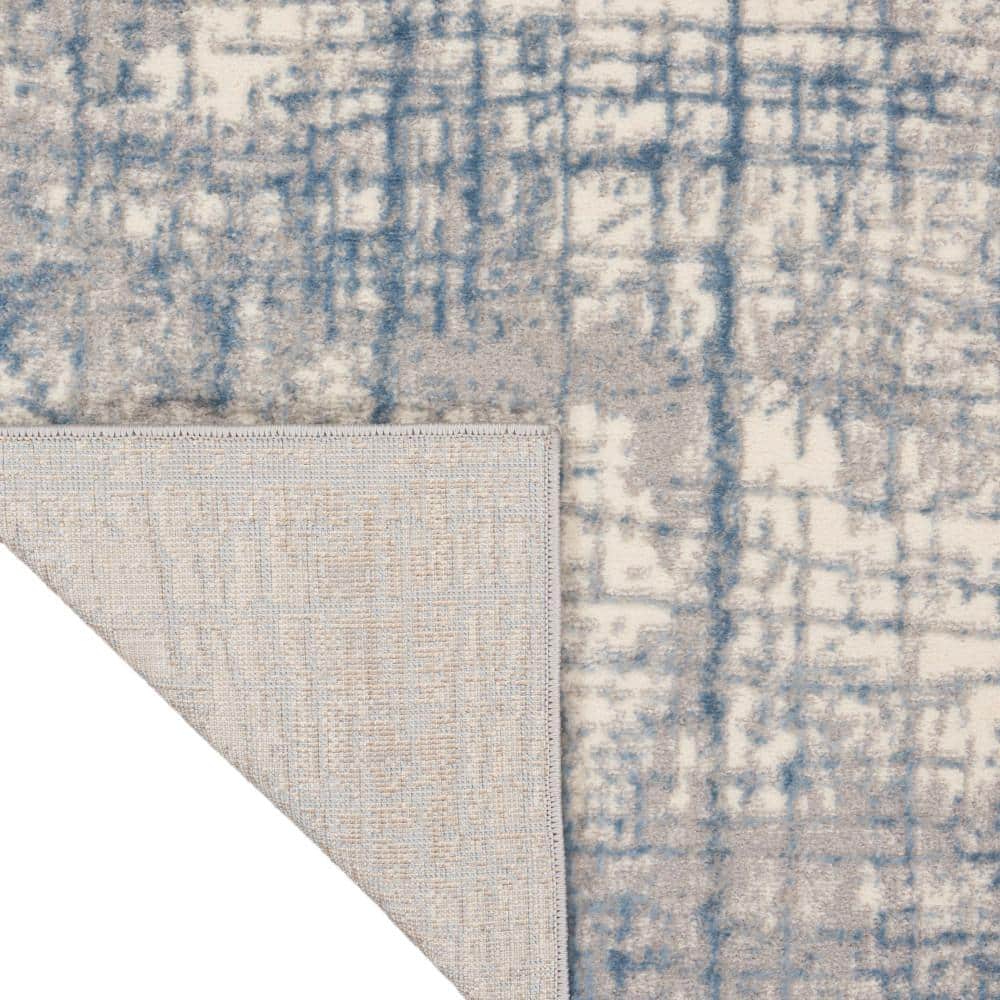 Ivory Blue Abstract 5' x 7' Synthetic Area Rug