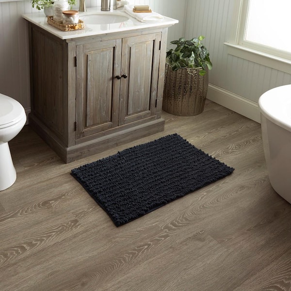 https://images.thdstatic.com/productImages/3370e6dd-87db-4946-95e5-803a8aa07d78/svn/indigo-mohawk-home-bathroom-rugs-bath-mats-103881-e1_600.jpg