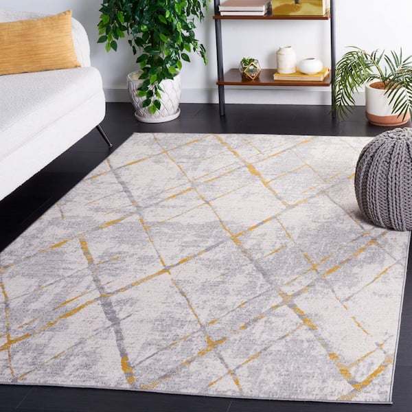 Odyssey 4 ft. x 6 ft. Gray/Gold Distressed Geometric Area Rug