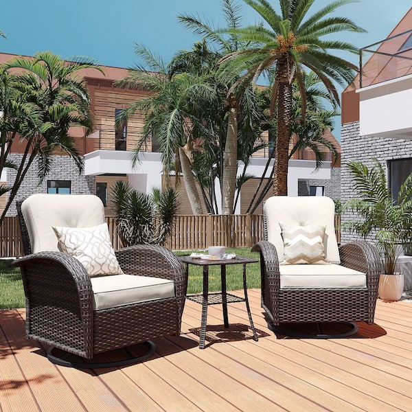 3-Piece Wicker Outdoor Rocking Chair Patio Swivel Chair Set with Table and White Cushions