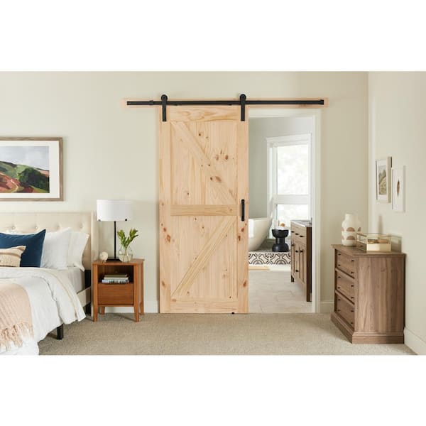 36 in. x 84 in. K-Bar Knotty Pine Wood Interior Sliding Barn Door Slab with Hardware Kit 36 in. x 84 in. K-Bar Knotty Pine Wood Interior Sliding Barn Door Slab with Hardware Kit
